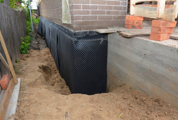 SJ Waterproofing Pros technician performing targeted Exterior Waterproofing assessment in Rochester, IN